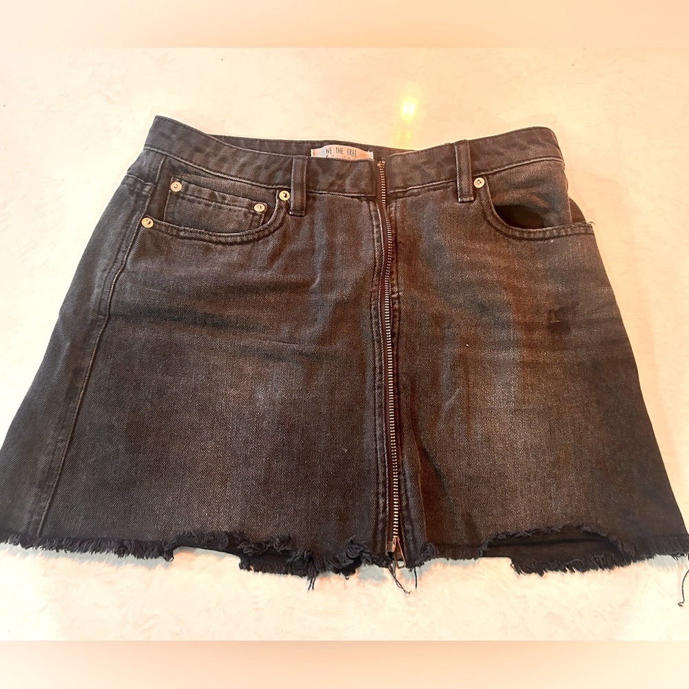 Free People black denim mini skirt. Size 28.